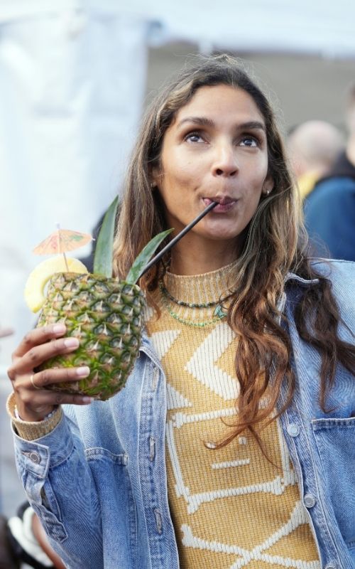 Drinking a cocktail